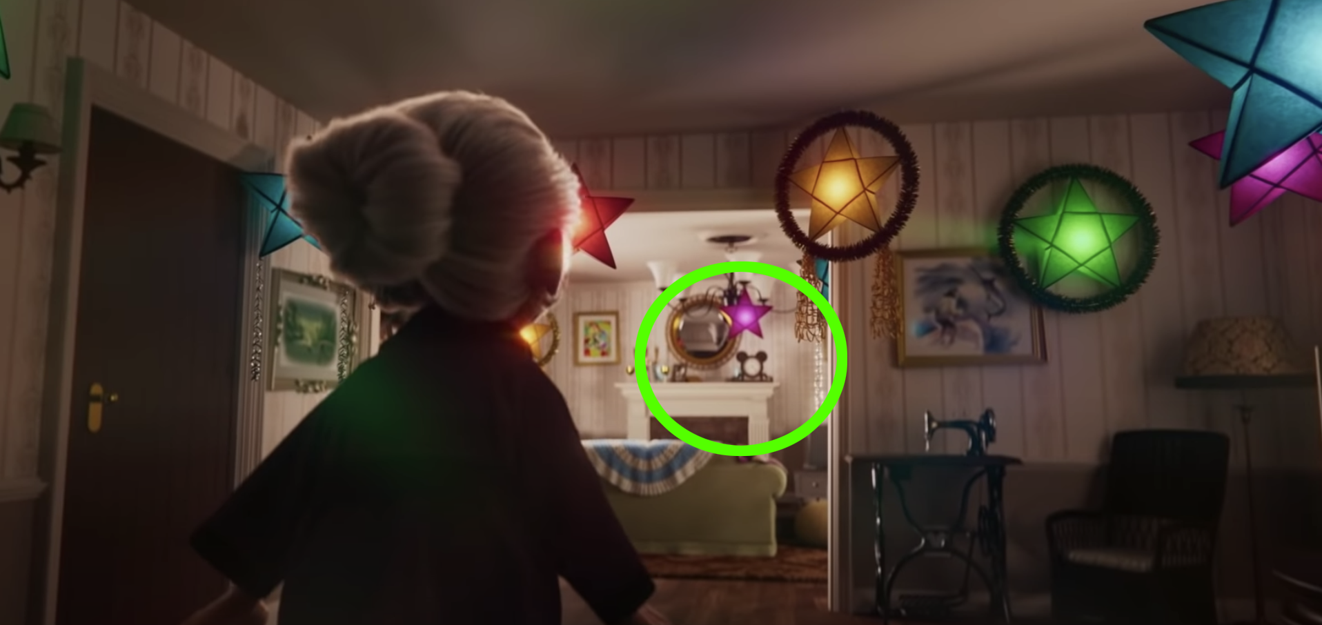 The hidden Mickey is a clock on the grandma&#x27;s mantle