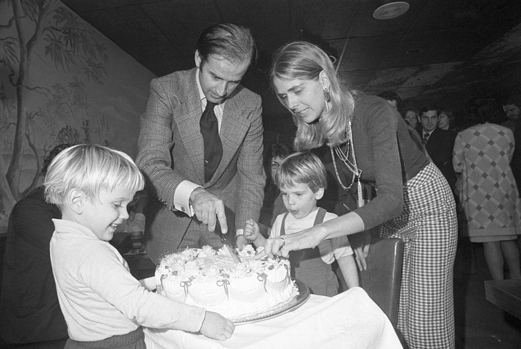 Black-and-white photo of Joe Biden with Neilia Biden and their children