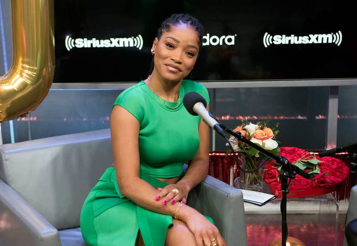Keke posing for a picture at a radio interview