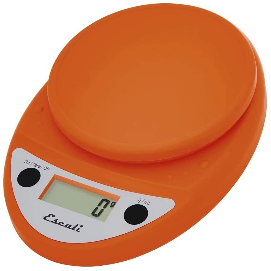 Orange smart food scale isolated on a white background