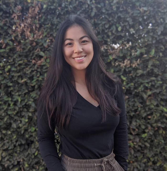 a portrait shot of the author Charis Barg smiling at the camera