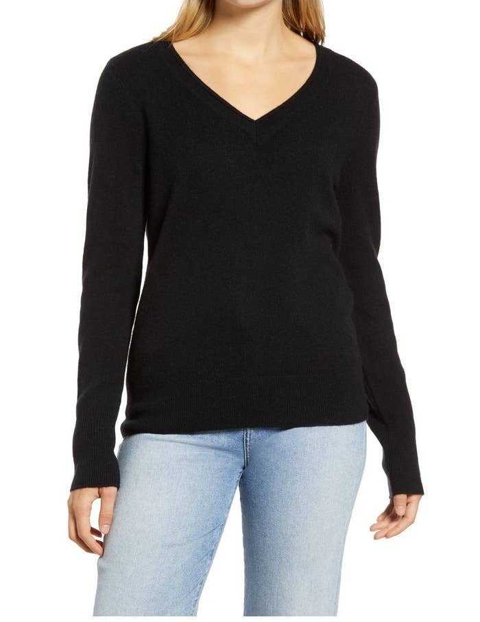 Model wearing the black sweater