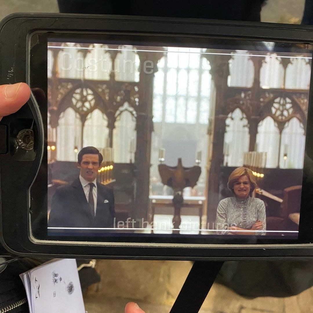 Josh and Emma making faces through the view point of a video camera lense