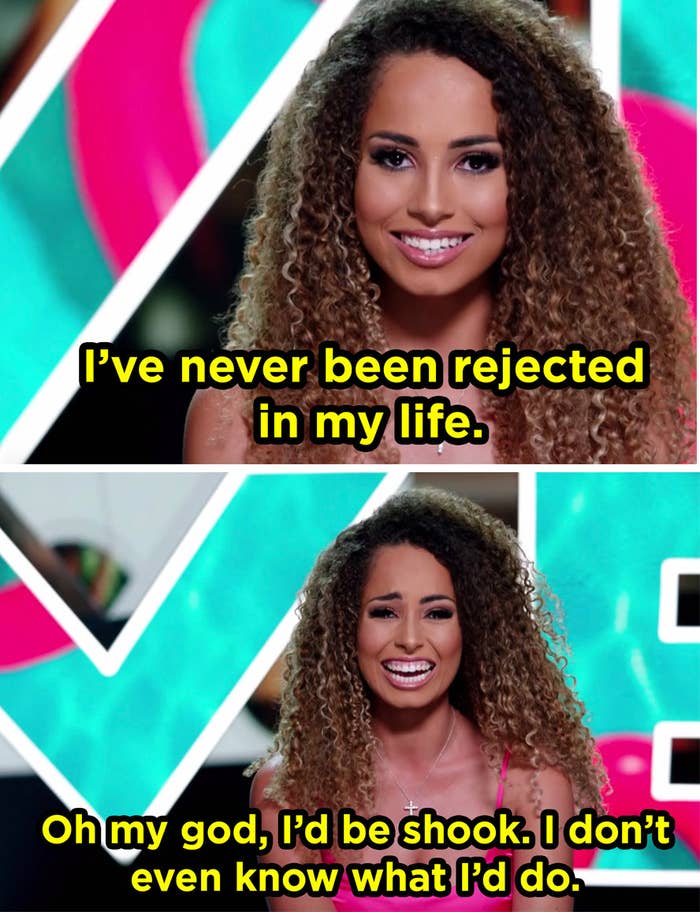 A woman with fluffy, curly hair sits on a chair. She says, "I've never been rejected in my life, oh my god i'd be shook, i don't even know what i'd do"