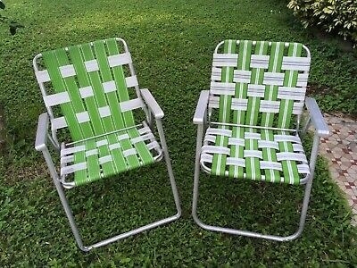 Two folding lawn chairs