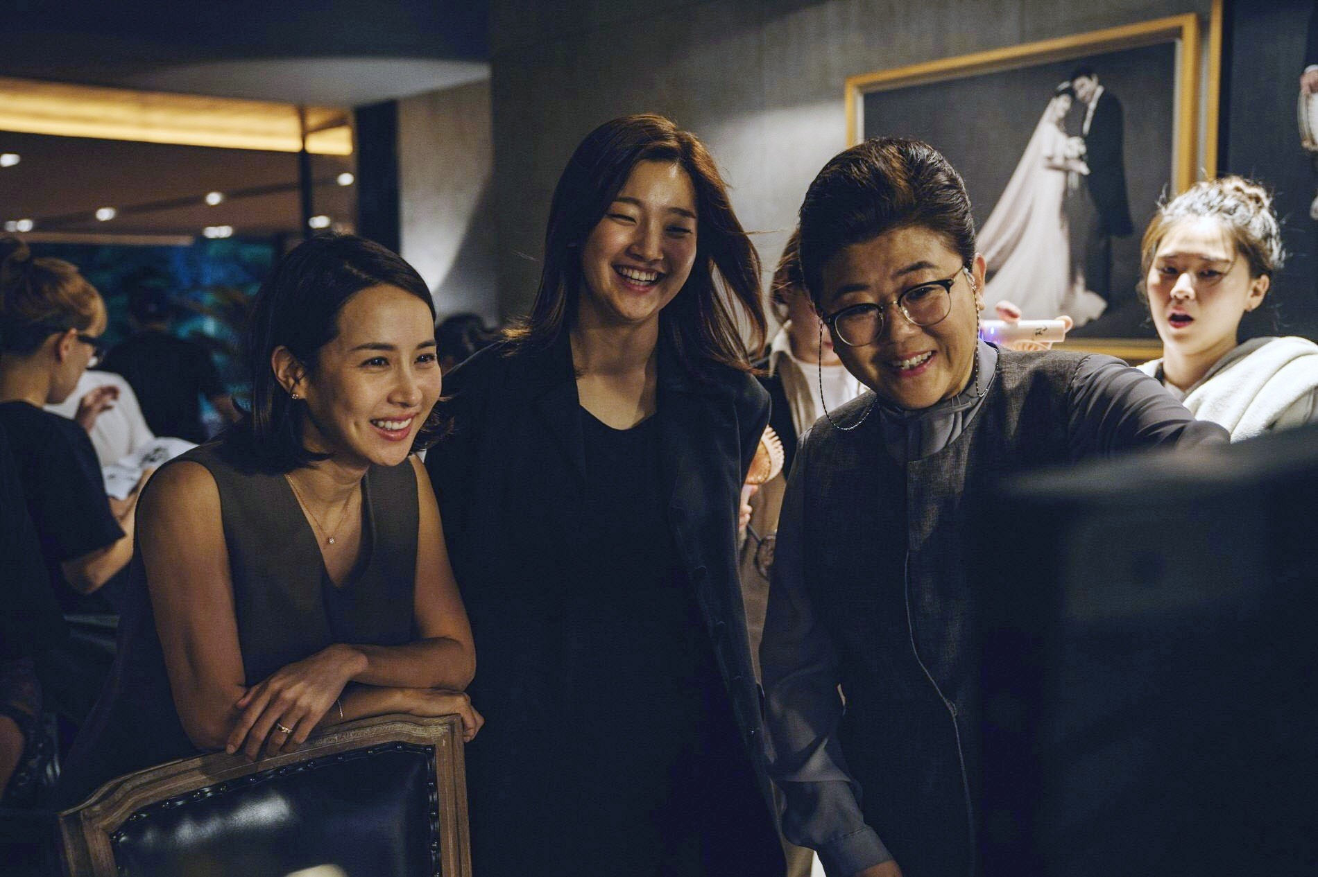 Yeo-jeong, So-dam, and Jung-eun watching a scene