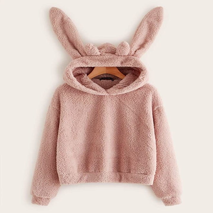 the pink sweater with long bunny ears on top 