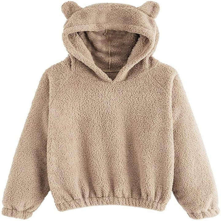 the brown sweater with bear ears on the hoodie 