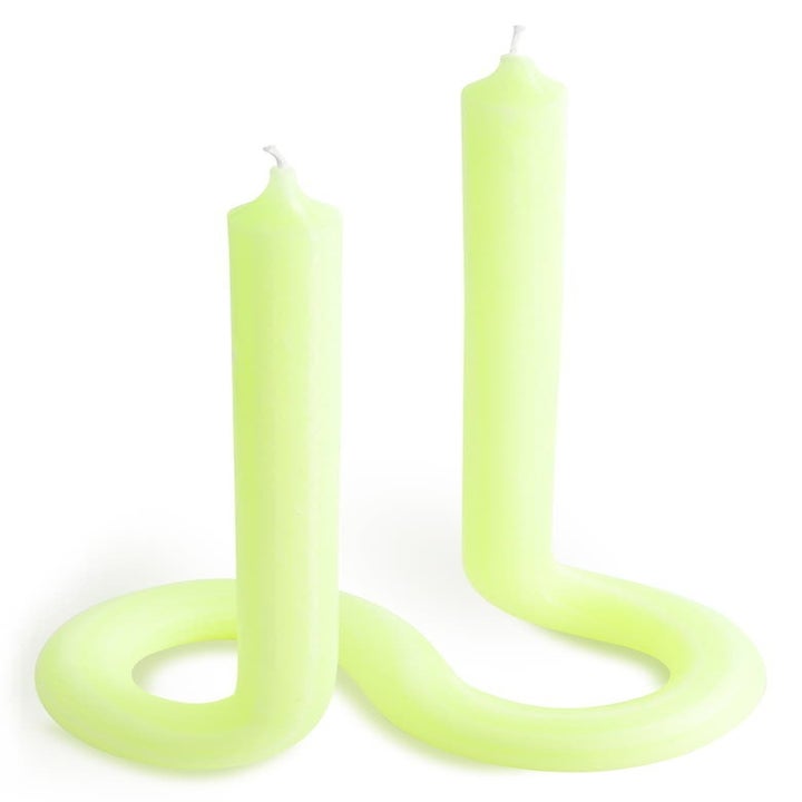 The double-ended candle in yellow