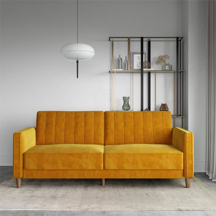 Yellow velvet couch