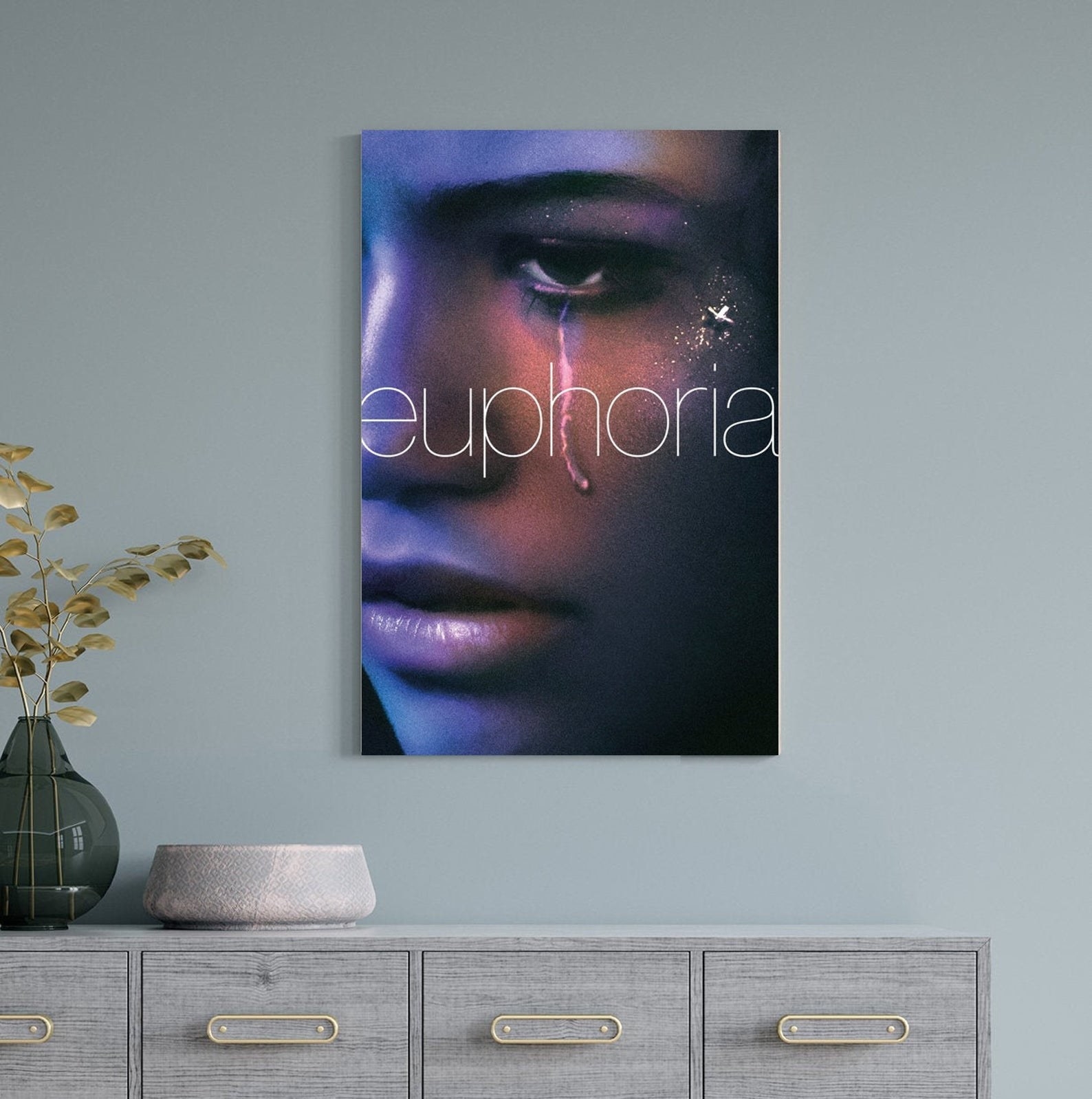the euphoria canvas poster on a wall