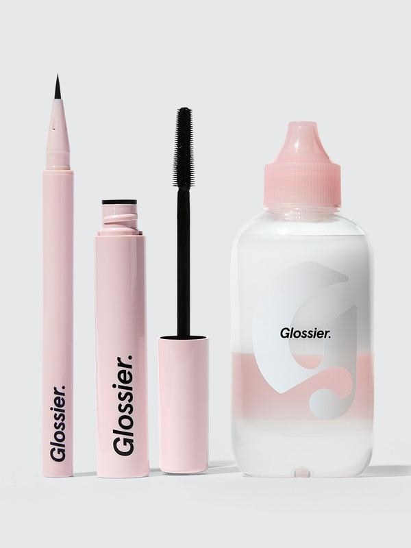 Pink container of liquid eyeliner, pink container of mascara container, and clear container of waterproof makeup remover