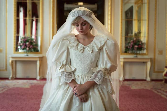 Emma Corrin as Princess Diana; she is wearing a recreation of Diana&#x27;s wedding dress
