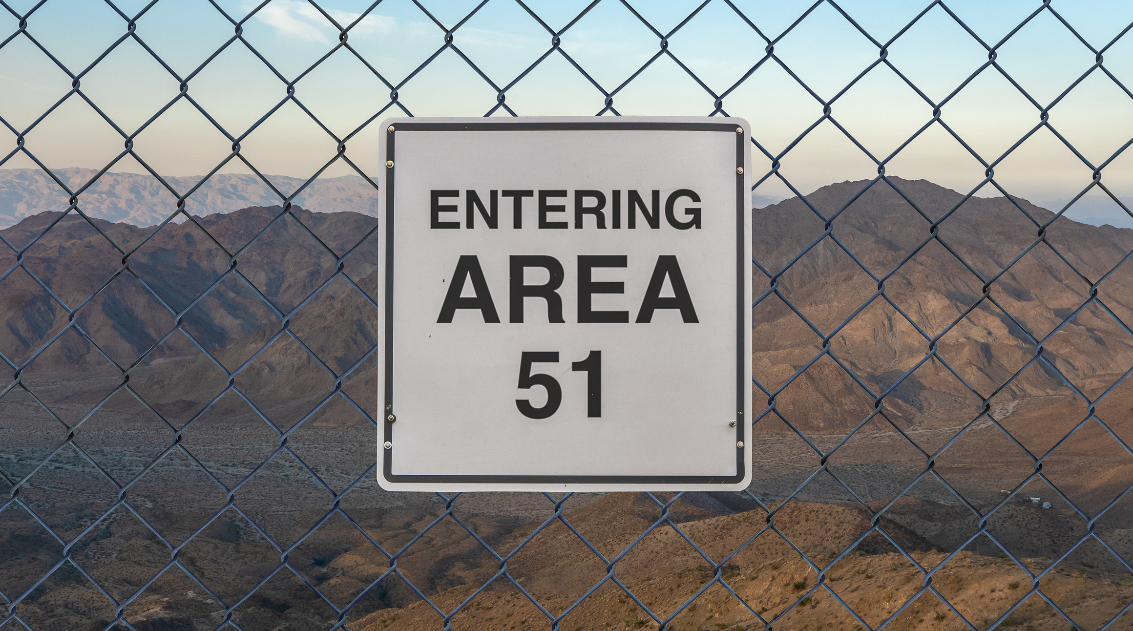 Area 51 sign on a chain-link fence