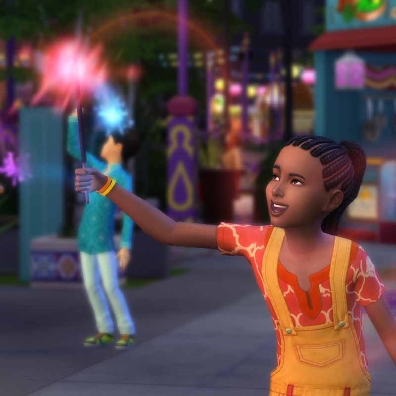 A small Sim plays with a magic wand