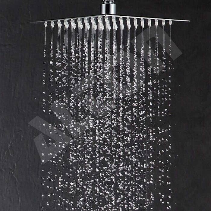 A showerhead with water pouring 