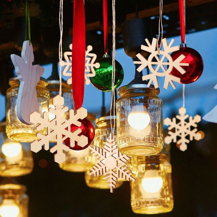 The ornaments hung up with mason jar lamps.