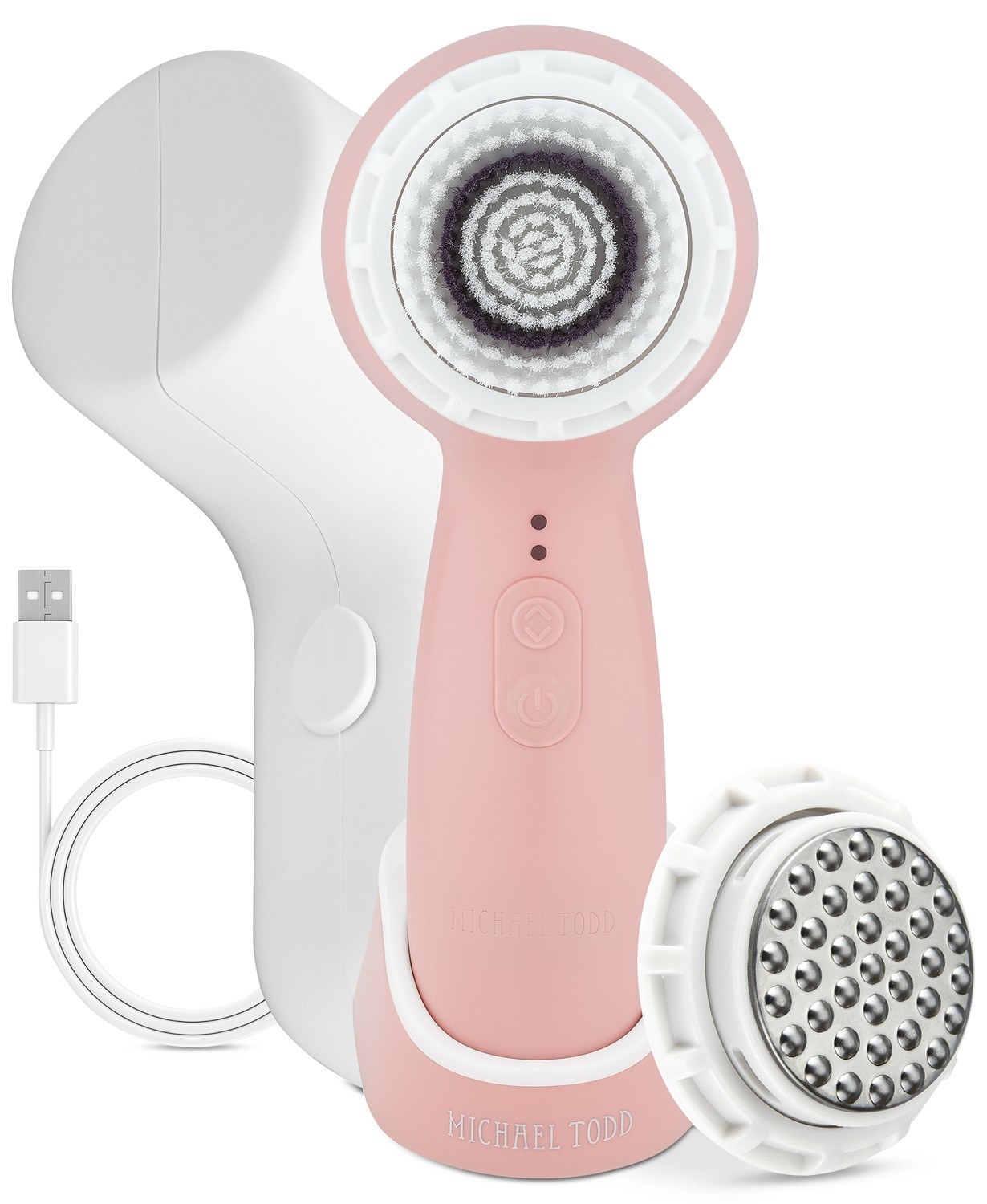The Millennial pink set which comes with the cleansing tool, antimicrobial brush head, massage treatment brush head, travel case, wireless charging stand, and USB cord 