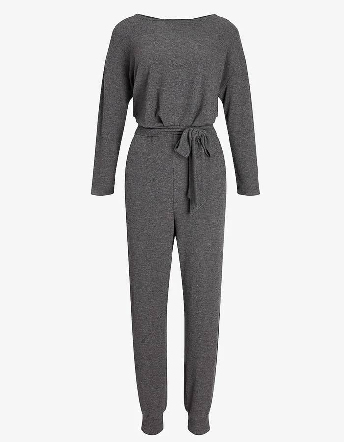 A dark gray jumpsuit with a belt 