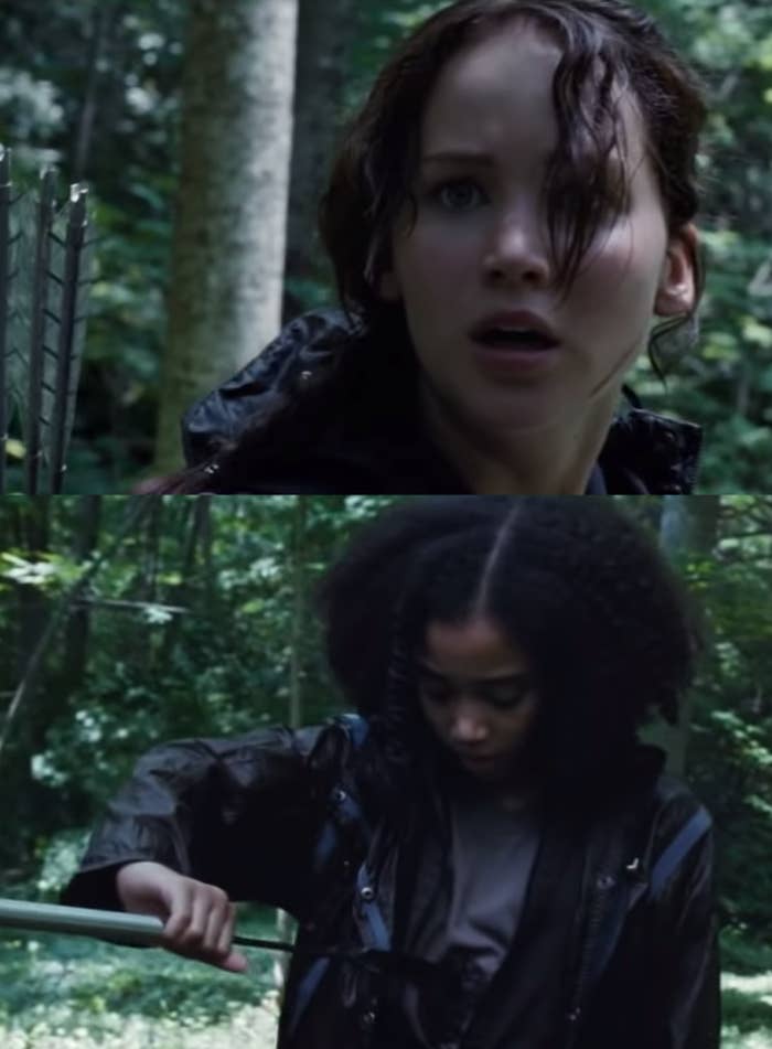 Jennifer Lawrence as Katniss Everdeen and Amandla Stenberg as Rue in the movie "The Hunger Games."