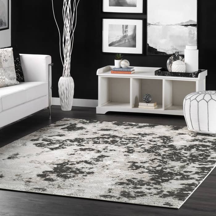 the rug on top of dark wooden floors