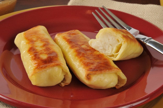 Blintzes filled with cheese on a plate