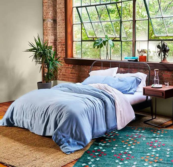 blue eucalyptus sheets on a bed
