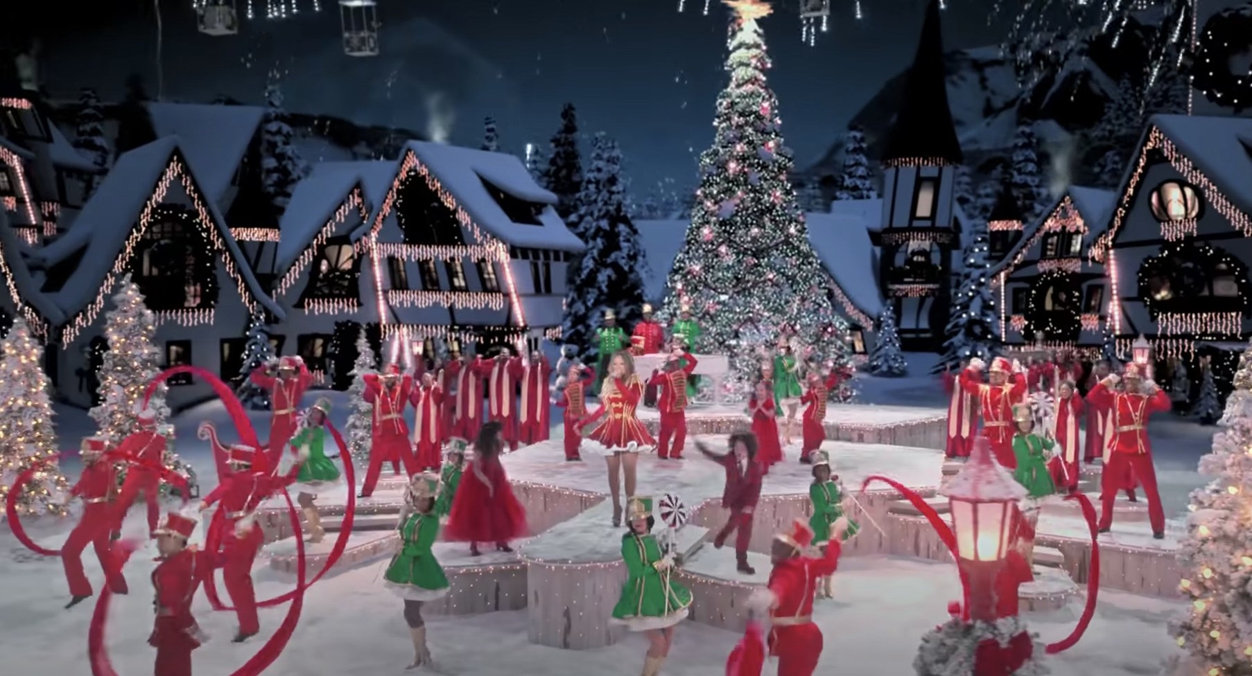 Mariah Carey surrounded by elves