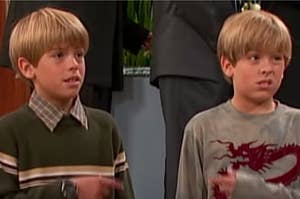 zack and cody pointing at each other with a grimace