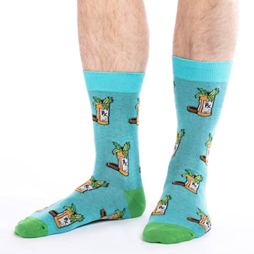 High socks with a weed pattern on them