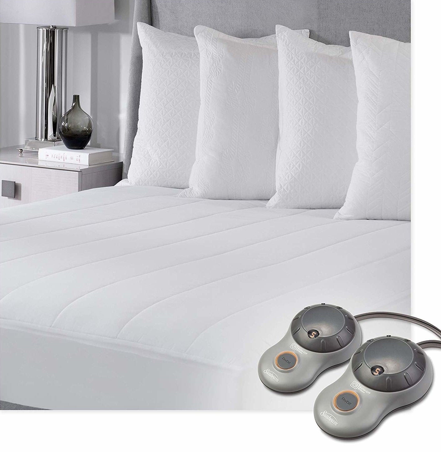 the heated mattress pads on a bed 