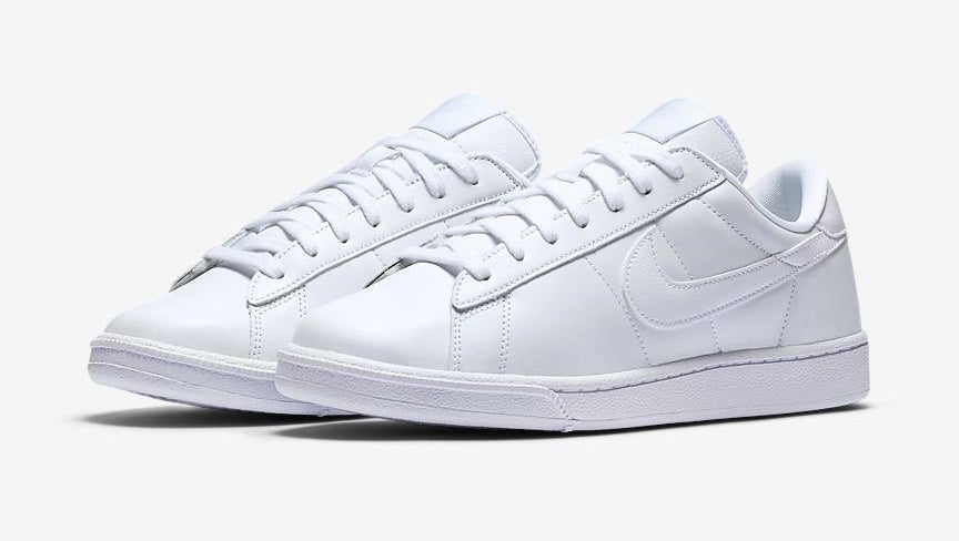 White Tennis Classic sneakers next to each other with a white Swoosh design on the side