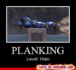 Halo character laying flat atop a box