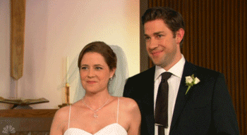 Jim and Pam from The Office smile on their wedding day