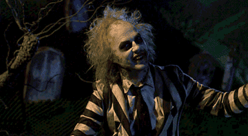 Beetlejuice&#x27;s grand entrance in the graveyard 