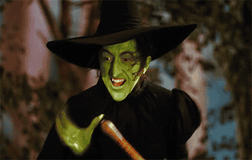 The Wicked Witch laughing manically  