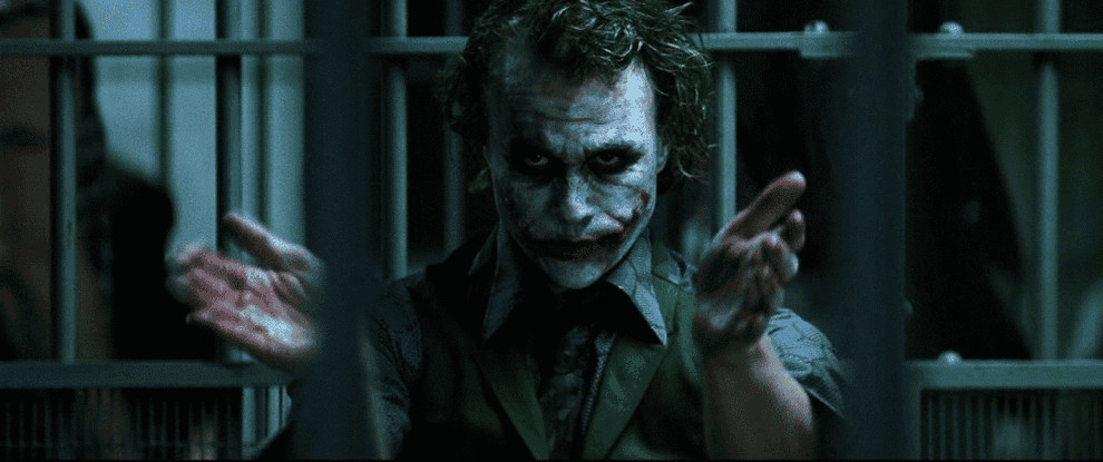 Joker clapping in his prison cell
