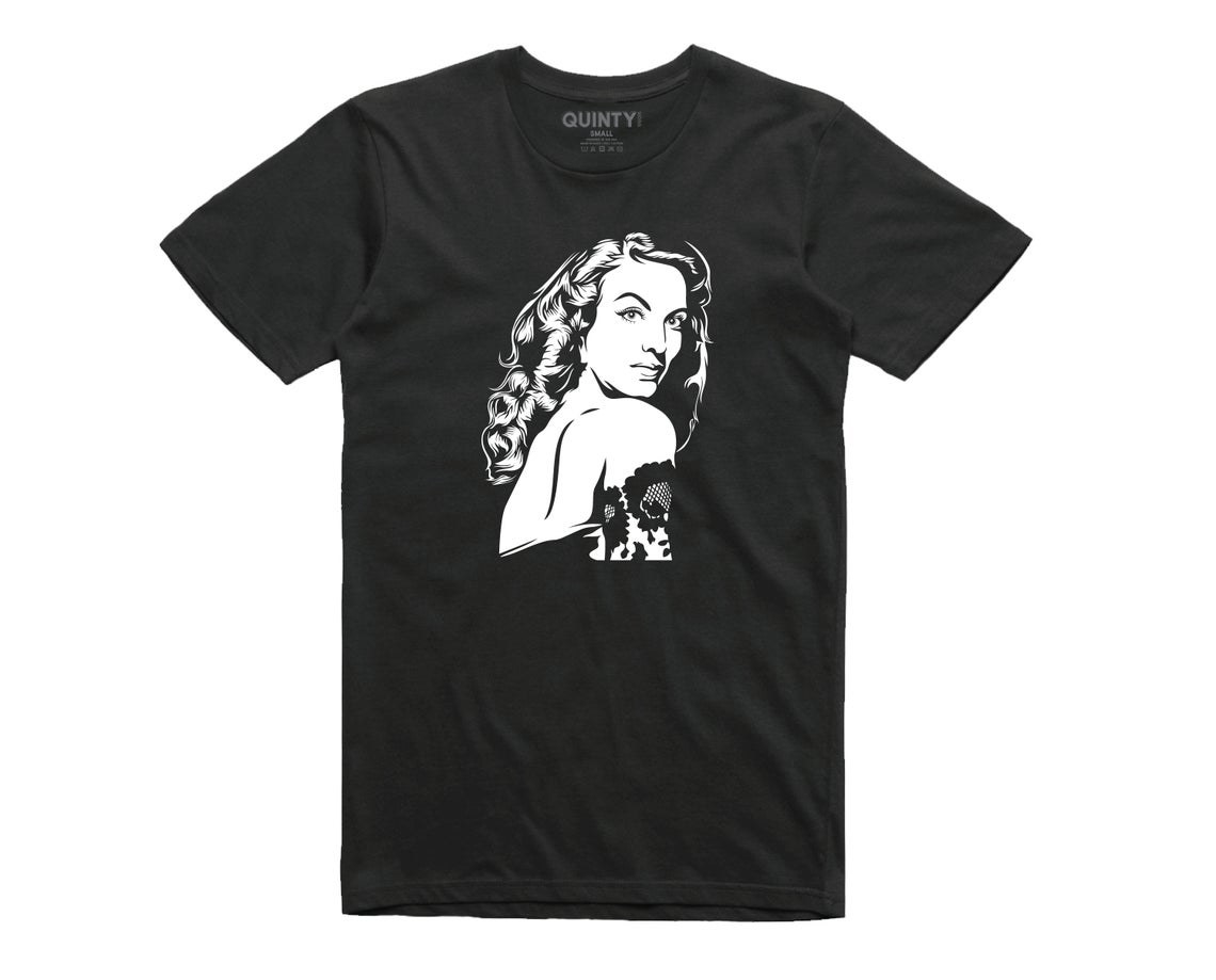 A black T-shirt with a drawing of María Félix looking over her shoulder on it