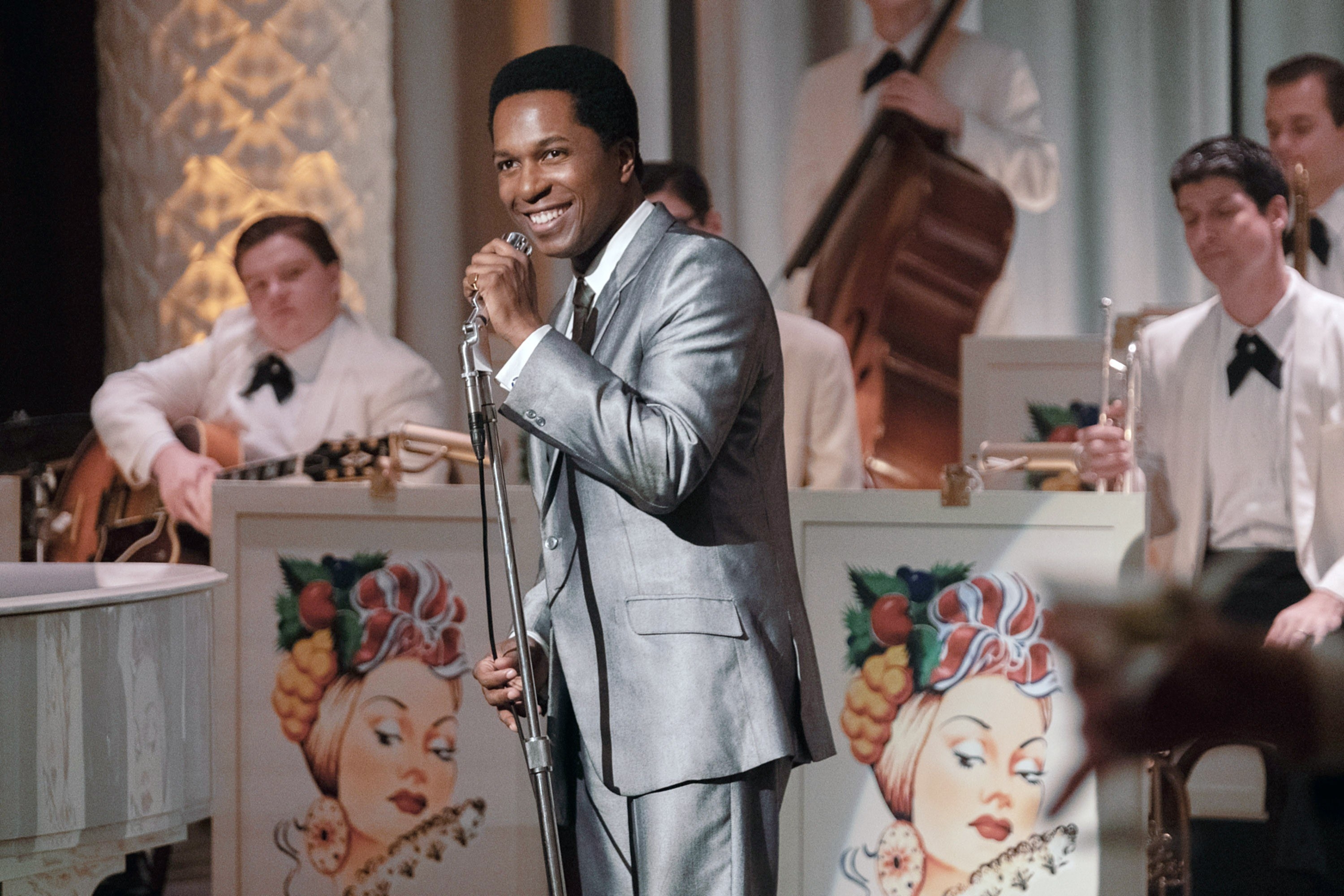 Leslie Odom Jr. wearing a shiny suit as Sam Cooke