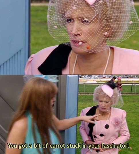 At the racetrack, Kim points to Kath&#x27;s fascinator with text that reads &quot;you got a bit of carrot stuck in your fascinator&quot;