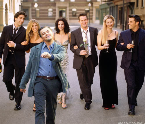 Leonardo Di Caprio walking with the cast of friends