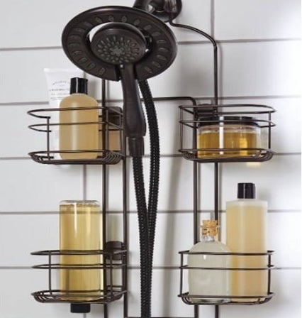 The caddy hung up with items on shelves