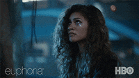 Jules and Rue stare at each other as Jules boards a train during a scene of Euphoria. 