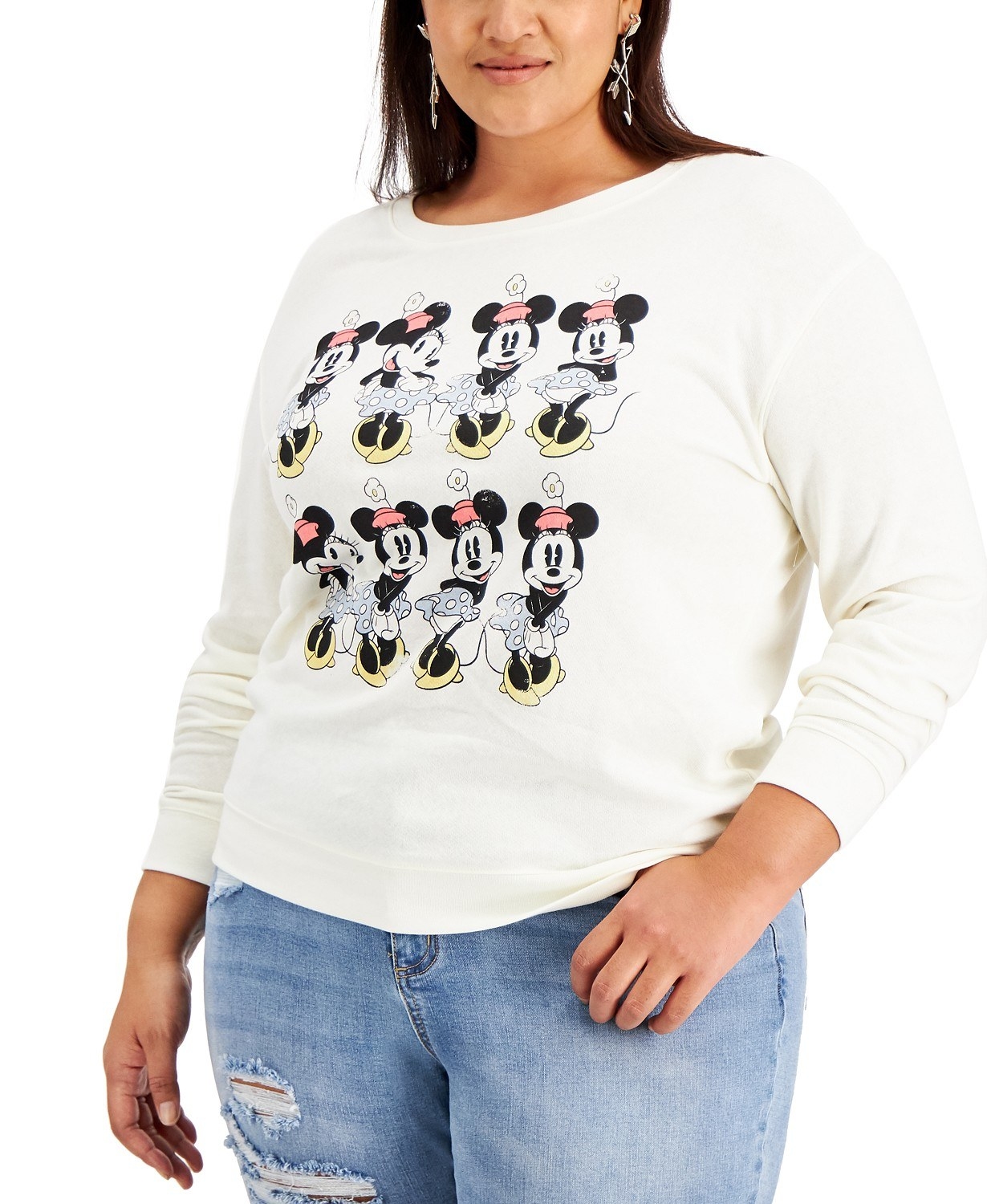 Model wearing white sweatshirt with Minnie Mouse print