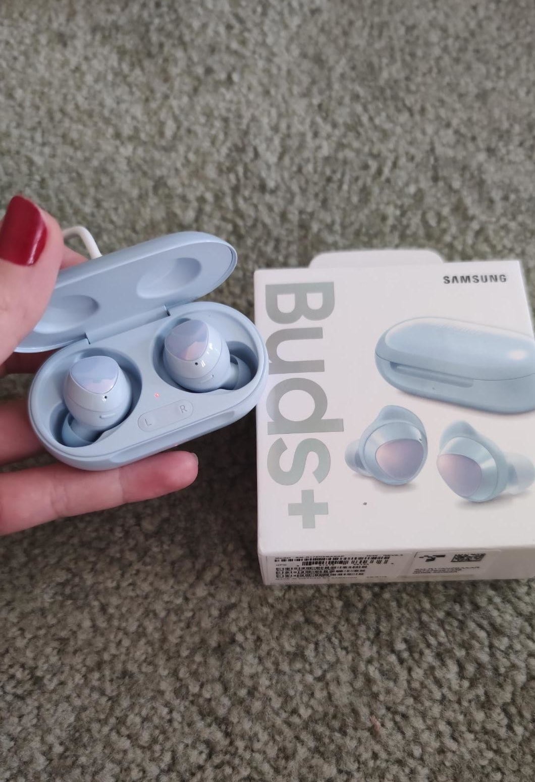 reviewer image of the cloud blue samsung galaxy buds plus