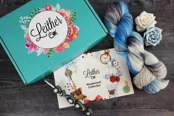 The Leither Collection box with a crochet hook and yarn