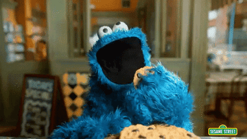 Cookie Monster devouring chocolate chip cookies