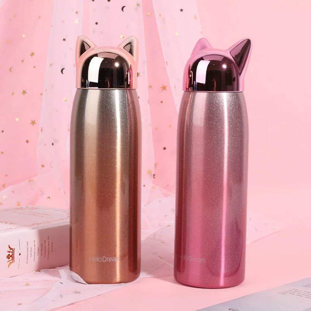 two thermos&#x27; with cat ear lids on a table