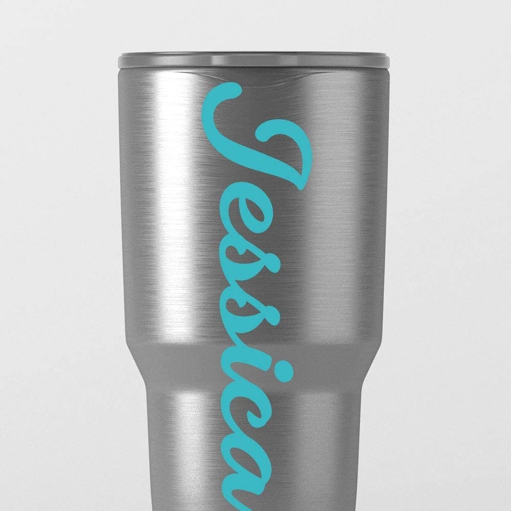 a personalized name decal on a water bottle