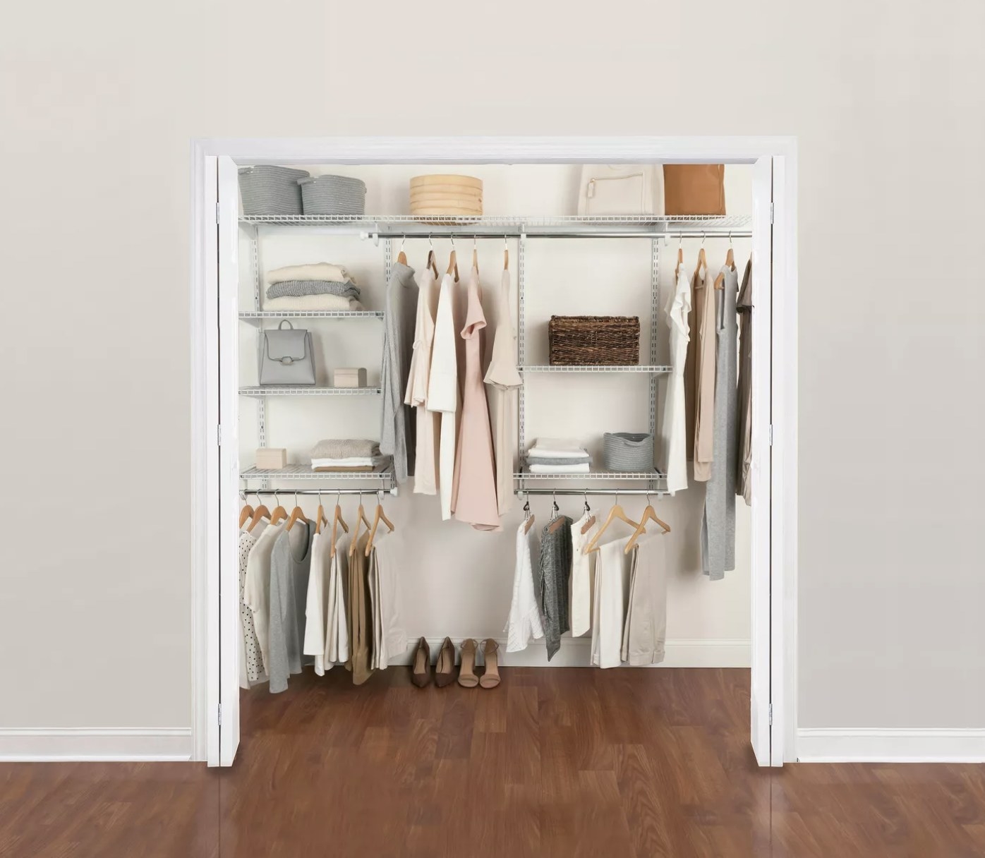 The closet system with clothes hung up